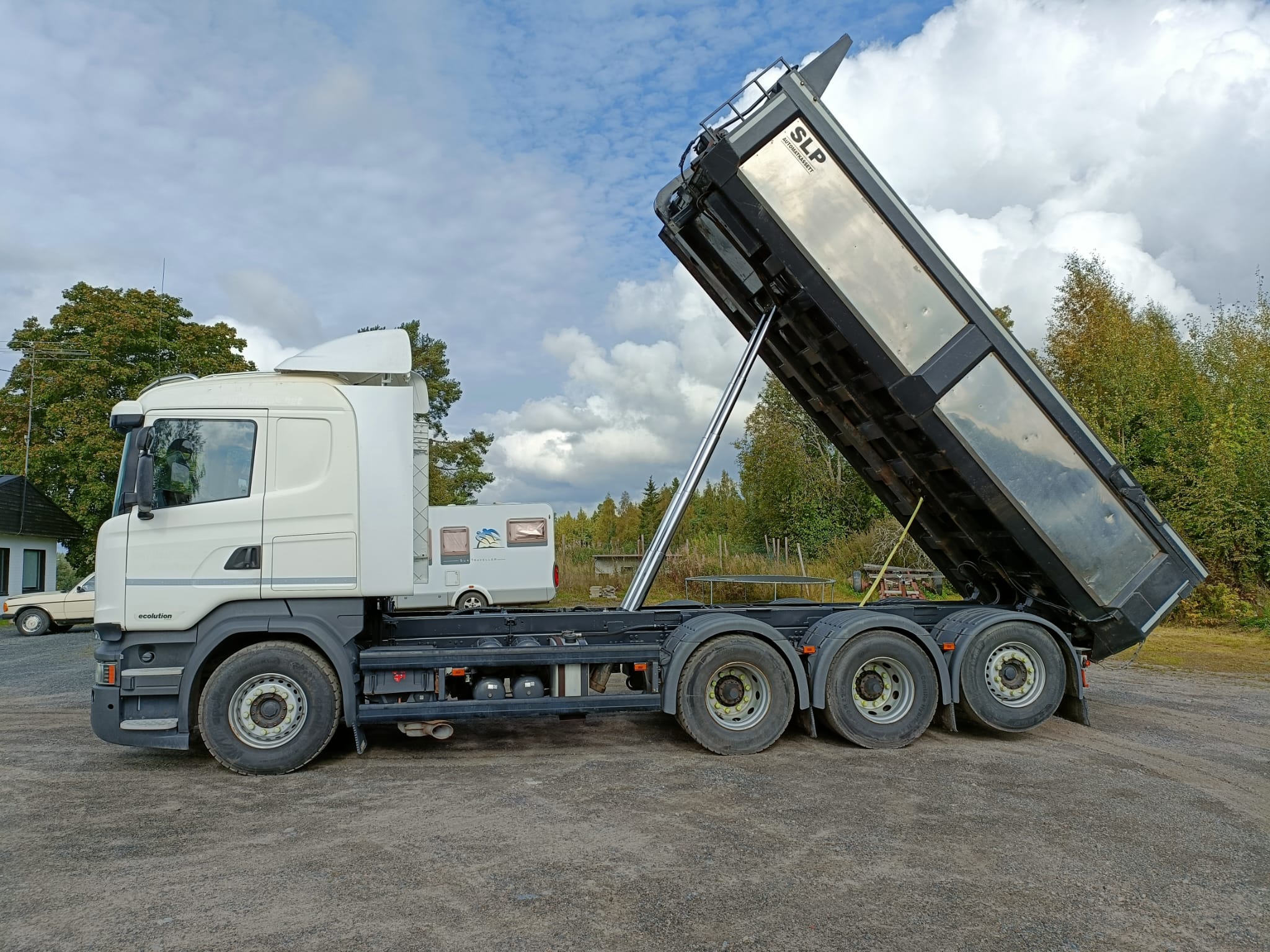 Lastbil, jordbyggnads transporter och snöröjning